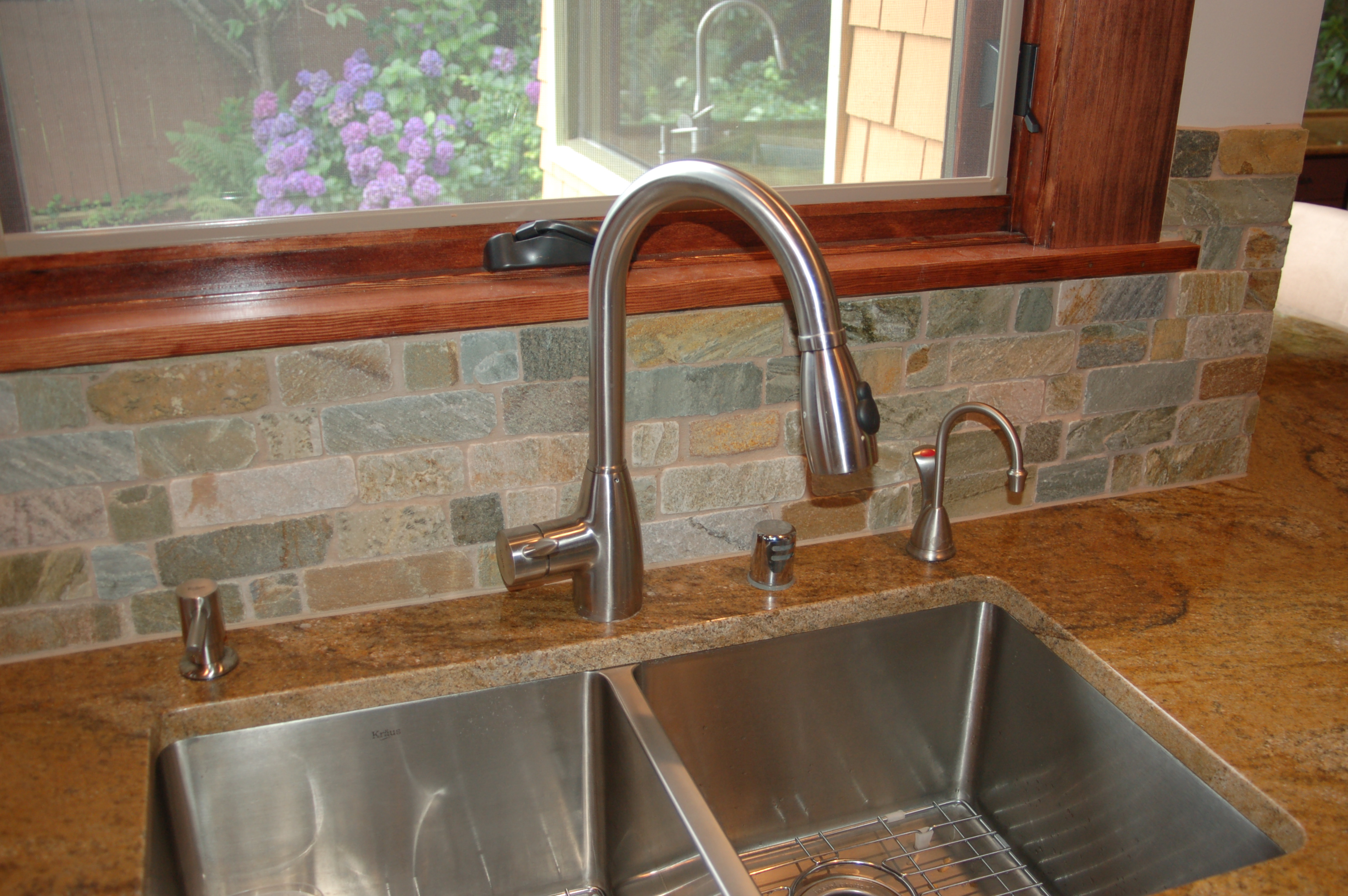 stainless steel kitchen sink and faucet